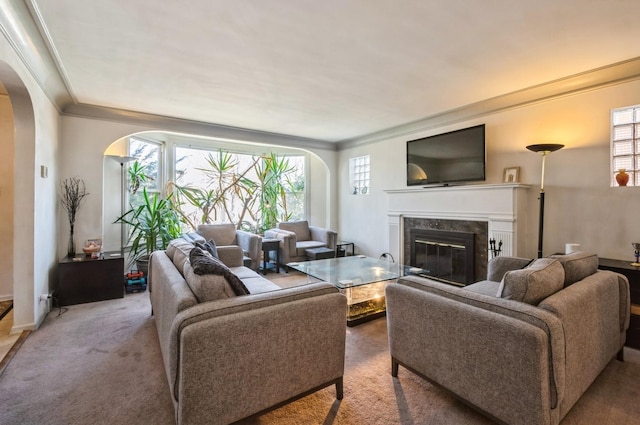 6504 N Artesian Ave, Chicago, IL 60645 - living area with arched walkways, a high end fireplace, ornamental molding, carpet, and baseboards