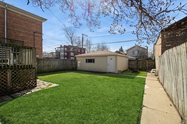 6504 N Artesian Ave, Chicago, IL 60645 - view of yard with an outdoor structure and a deck