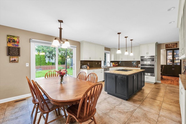 3408 Mill Creek Ct, Champaign, IL 61822 - dining area with plenty of natural light and baseboards