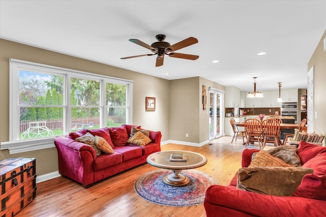 3408 Mill Creek Ct, Champaign, IL 61822 - living area featuring a ceiling fan, light wood-style flooring, baseboards, and recessed lighting