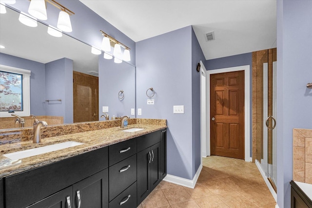 3408 Mill Creek Ct, Champaign, IL 61822 - full bath with double vanity, a stall shower, tile patterned flooring, and baseboards