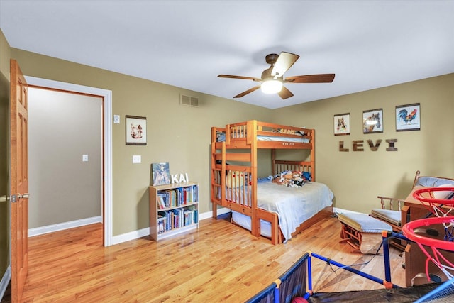 3408 Mill Creek Ct, Champaign, IL 61822 - bedroom featuring wood finished floors, baseboards, and ceiling fan