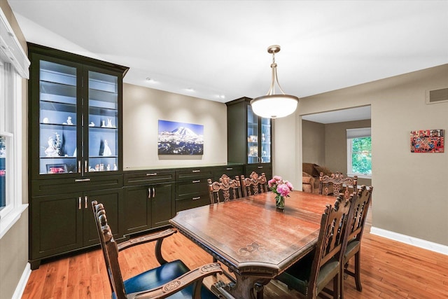 3408 Mill Creek Ct, Champaign, IL 61822 - dining space featuring baseboards, light wood-style floors, and recessed lighting