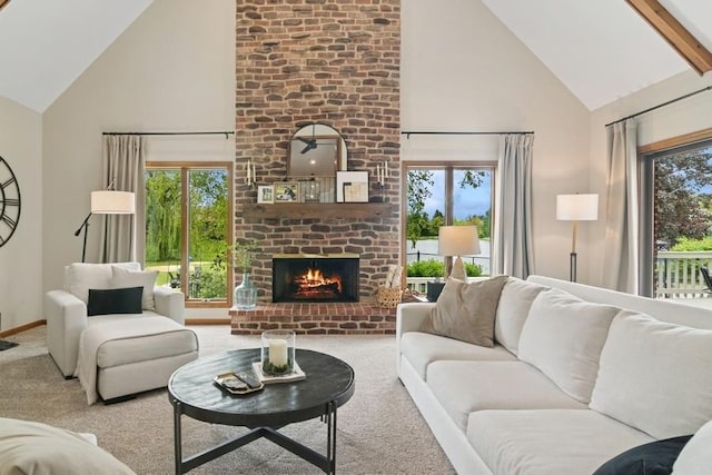 22902 W Lochanora Dr, Hawthorn Woods, IL 60047 - carpeted living room featuring high vaulted ceiling, a fireplace, and baseboards