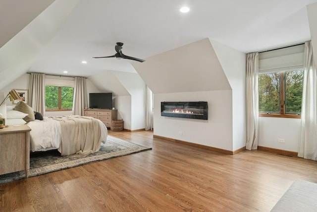 22902 W Lochanora Dr, Hawthorn Woods, IL 60047 - bedroom featuring wood finished floors, baseboards, vaulted ceiling, recessed lighting, and a ceiling fan