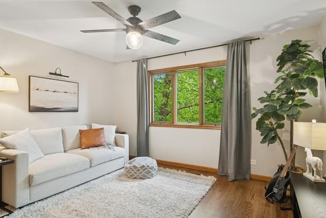 22902 W Lochanora Dr, Hawthorn Woods, IL 60047 - living room with wood finished floors, baseboards, and ceiling fan