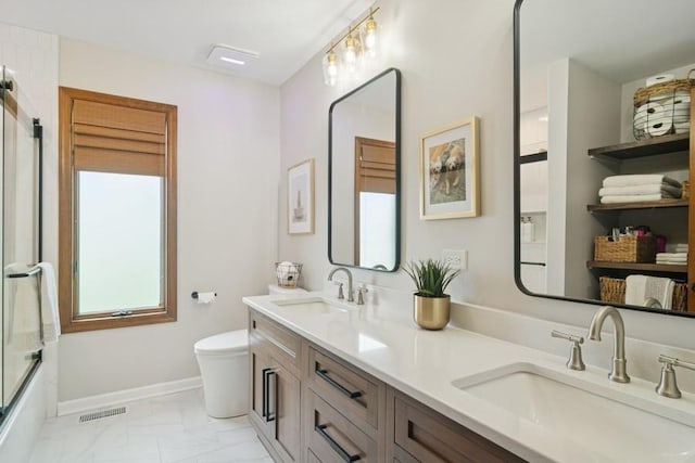 22902 W Lochanora Dr, Hawthorn Woods, IL 60047 - bathroom featuring marble finish flooring, double vanity, toilet, and baseboards
