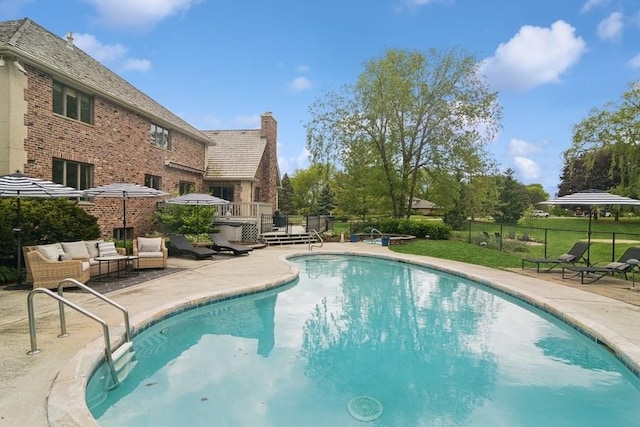 22902 W Lochanora Dr, Hawthorn Woods, IL 60047 - view of swimming pool featuring a patio, a deck, and an outdoor hangout area