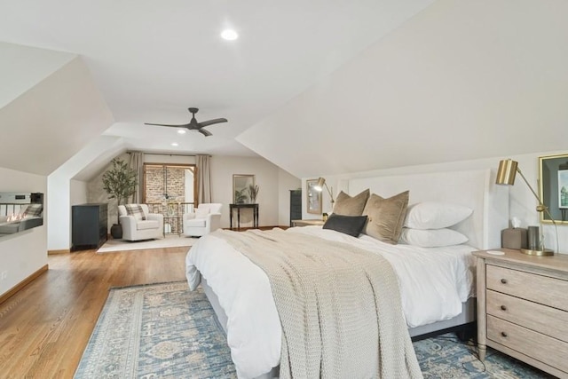 22902 W Lochanora Dr, Hawthorn Woods, IL 60047 - bedroom featuring wood finished floors, lofted ceiling, a ceiling fan, baseboards, and recessed lighting