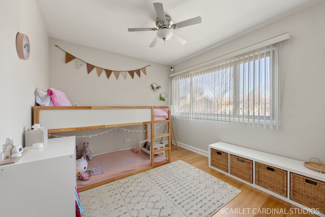 647 Glacier Trl, Roselle, IL 60172 - bedroom featuring light wood-type flooring, baseboards, and a ceiling fan