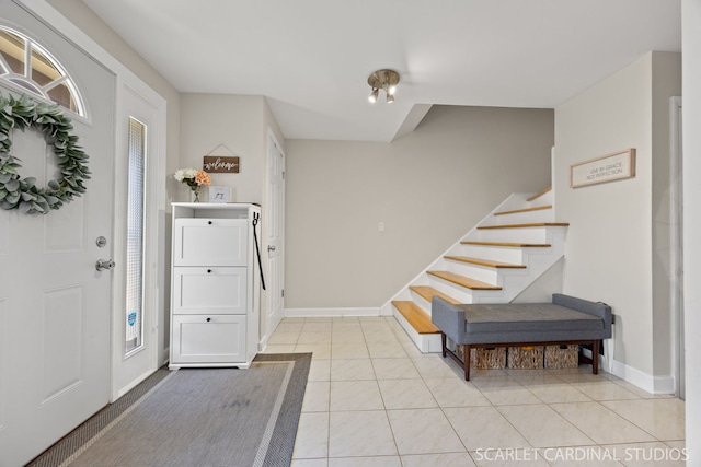 647 Glacier Trl, Roselle, IL 60172 - entrance foyer with stairway, baseboards, and light tile patterned floors