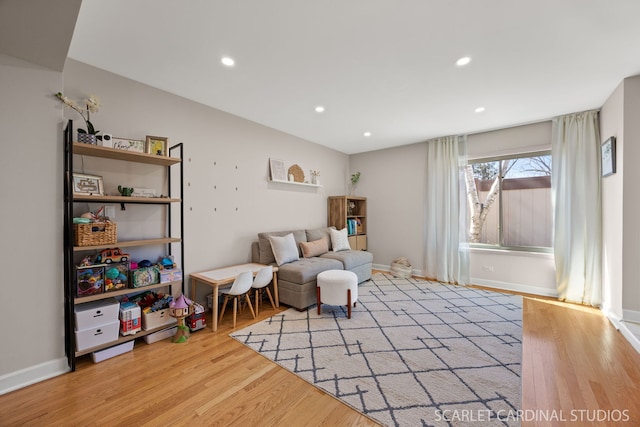 647 Glacier Trl, Roselle, IL 60172 - living area with wood finished floors, recessed lighting, and baseboards