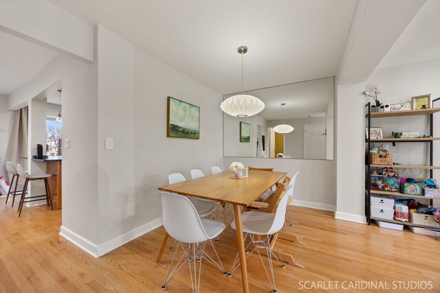 647 Glacier Trl, Roselle, IL 60172 - dining space with light wood finished floors and baseboards