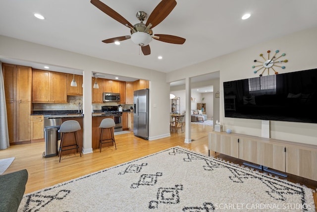 647 Glacier Trl, Roselle, IL 60172 - living room with ceiling fan, light wood-style flooring, recessed lighting, and baseboards