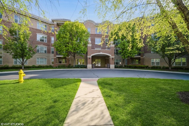 2700 Summit Dr Unit 307, Glenview, IL 60025 - view of community with a lawn