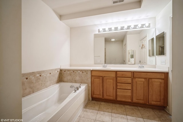 2700 Summit Dr Unit 307, Glenview, IL 60025 - full bathroom with double vanity, a bath, and tile patterned floors