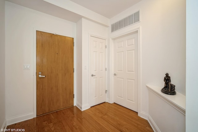 2700 Summit Dr Unit 307, Glenview, IL 60025 - corridor featuring wood finished floors and baseboards