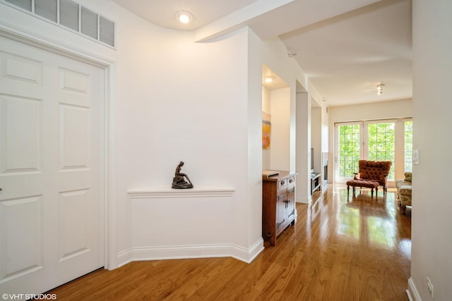 2700 Summit Dr Unit 307, Glenview, IL 60025 - corridor featuring wood finished floors and baseboards