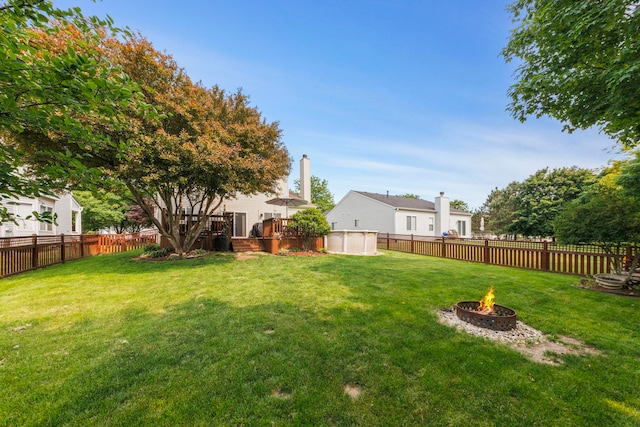 1876 Ione Ln, Aurora, IL 60503 - view of yard with a fire pit and a wooden deck