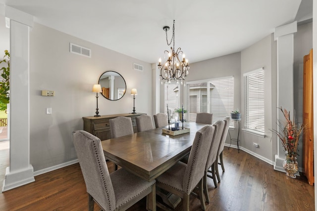 1876 Ione Ln, Aurora, IL 60503 - dining area featuring baseboards, dark wood-style flooring, and a chandelier
