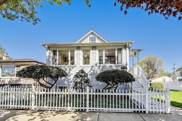 3321 Ruby St, Franklin Park, IL 60131 - view of front facade with a fenced front yard