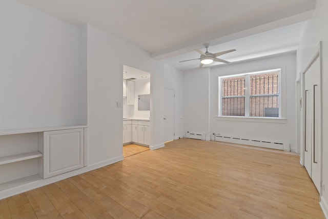 431 W Oakdale Ave Unit 1C, Chicago, IL 60657 - unfurnished bedroom featuring baseboard heating, light wood-style floors, ensuite bathroom, and ceiling fan