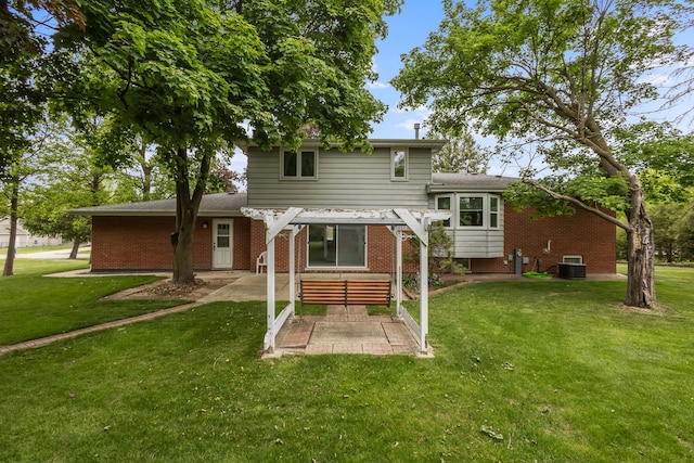 2841 E Pine Dr, Crete, IL 60417 - rear view of property with a pergola, a patio area, brick siding, and a lawn