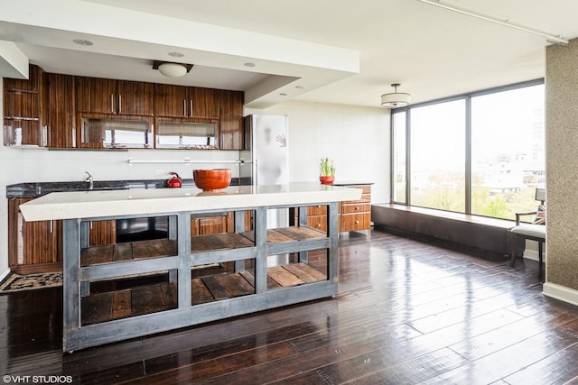 5455 N Sheridan Rd Unit 901, Chicago, IL 60640 - kitchen with dark wood-style flooring and freestanding refrigerator