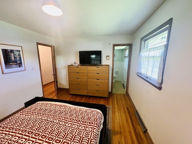 270 W Margaret Fuller Rd, Oregon, IL 61061 - bedroom with wood finished floors and baseboards