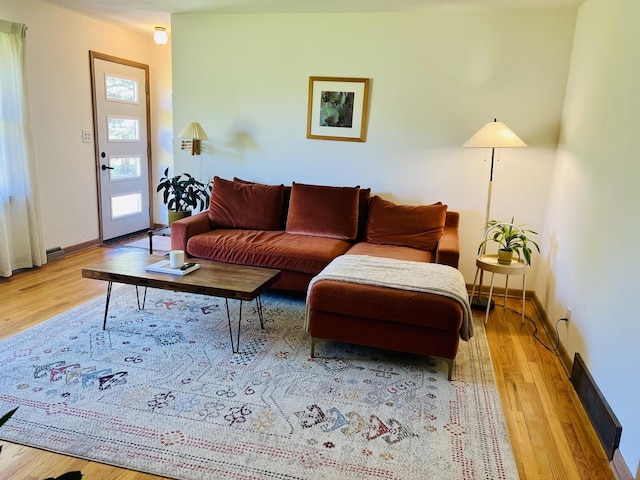 270 W Margaret Fuller Rd, Oregon, IL 61061 - living room featuring wood finished floors and baseboards