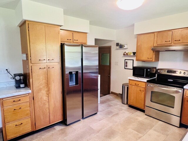 270 W Margaret Fuller Rd, Oregon, IL 61061 - kitchen featuring appliances with stainless steel finishes, under cabinet range hood, and light countertops