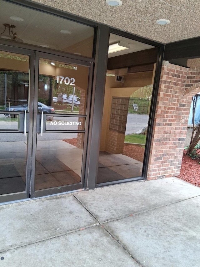 1702 Mill St Unit 502, Des Plaines, IL 60016 - doorway to property featuring brick siding