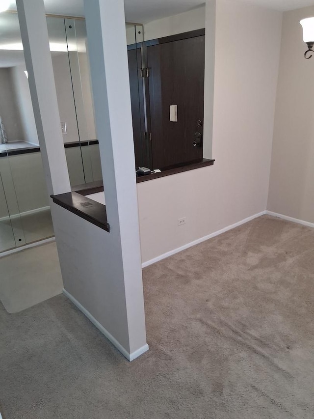 1702 Mill St Unit 502, Des Plaines, IL 60016 - carpeted empty room featuring baseboards