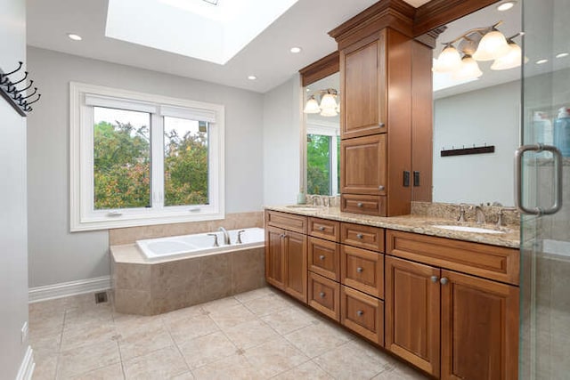 3211 Treyburn Rd, Naperville, IL 60564 - full bath featuring double vanity, a skylight, a garden tub, tile patterned floors, and baseboards