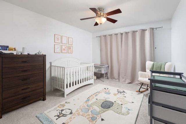 3211 Treyburn Rd, Naperville, IL 60564 - carpeted bedroom with a nursery area and a ceiling fan