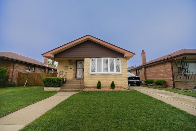 3743 E 112th St, Chicago, IL 60617 - bungalow-style home featuring brick siding and covered porch