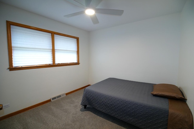 3743 E 112th St, Chicago, IL 60617 - carpeted bedroom featuring ceiling fan and baseboards