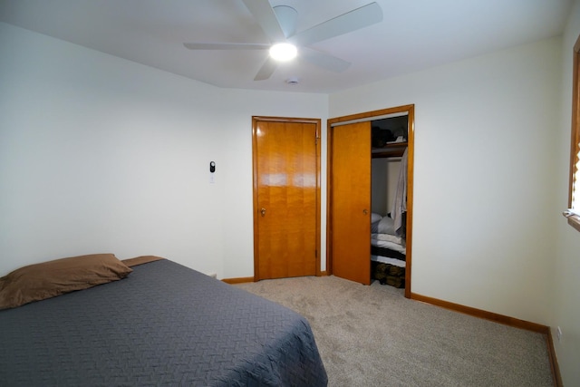 3743 E 112th St, Chicago, IL 60617 - bedroom featuring light colored carpet, a closet, ceiling fan, and baseboards