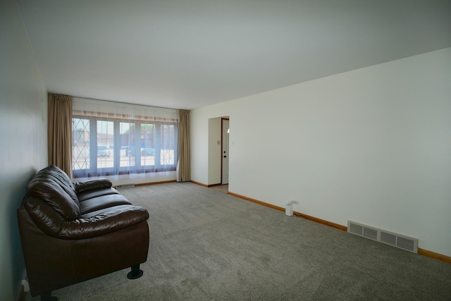 3743 E 112th St, Chicago, IL 60617 - living area featuring carpet floors and baseboards