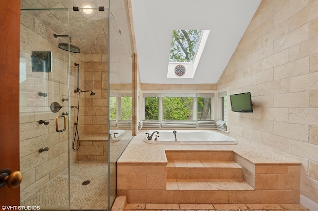 1138 Greentree Ave, Deerfield, IL 60015 - full bathroom featuring a skylight, a bath, vaulted ceiling, and a shower stall
