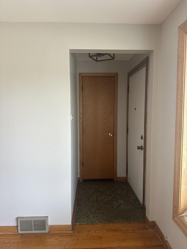 7804 Newland Ave, Burbank, IL 60459 - hallway with wood finished floors and baseboards
