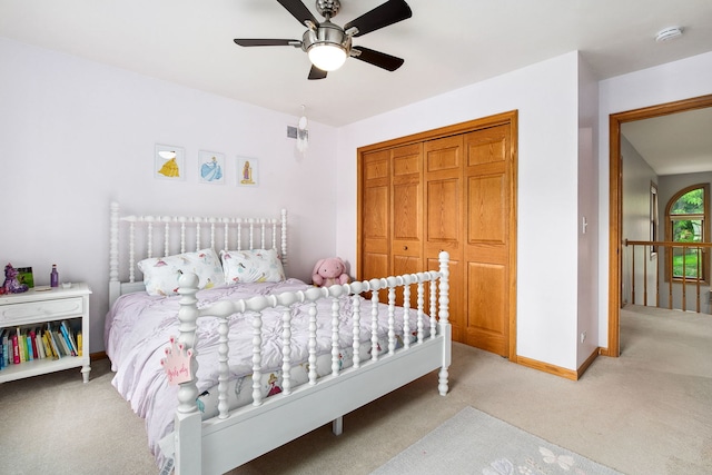 1284 N Jack Pine Ct, Palatine, IL 60067 - bedroom with light carpet, baseboards, a closet, and a ceiling fan