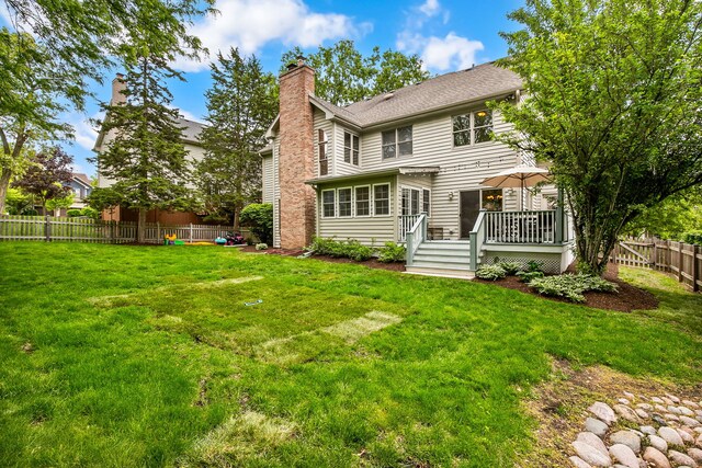 1284 N Jack Pine Ct, Palatine, IL 60067 - back of house featuring a chimney and a wooden deck