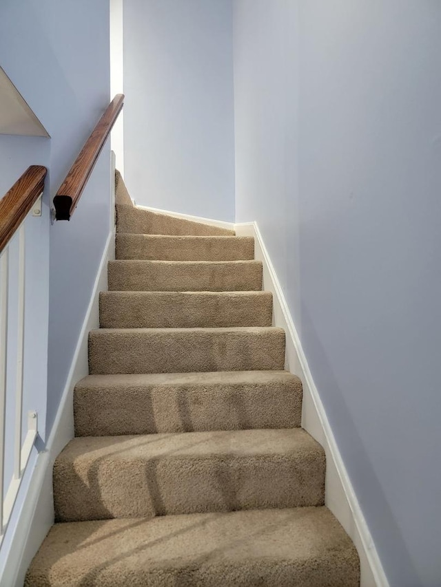 1744 Eastwood Ct Unit 9, Schaumburg, IL 60195 - staircase featuring carpet