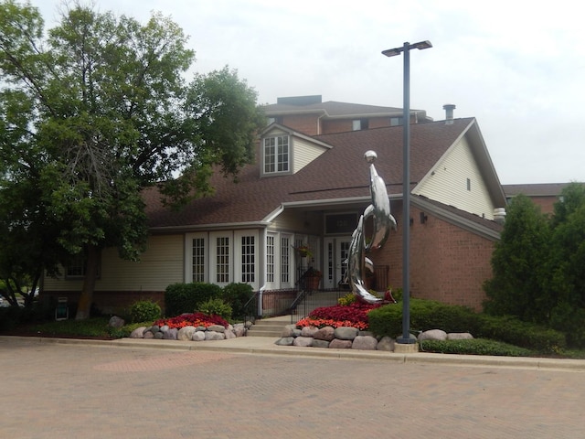 1744 Eastwood Ct Unit 9, Schaumburg, IL 60195 - view of front of property with brick siding