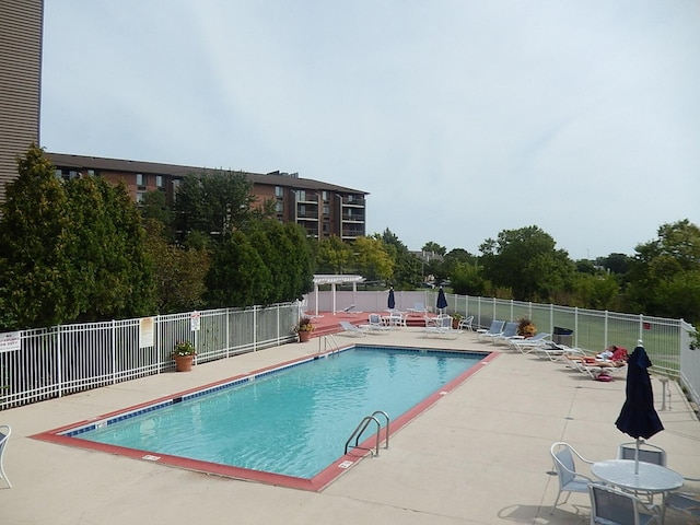 1744 Eastwood Ct Unit 9, Schaumburg, IL 60195 - community pool featuring a patio area
