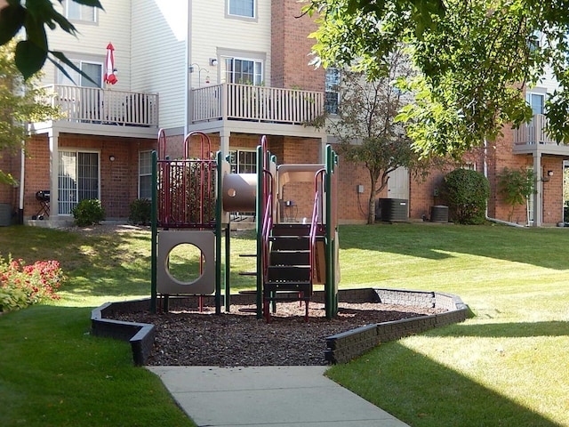 1744 Eastwood Ct Unit 9, Schaumburg, IL 60195 - community play area featuring a yard, central AC unit, and oil tank