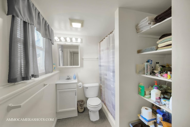 2N562 Atlantic Dr, West Chicago, IL 60185 - full bathroom with toilet, vanity, curtained shower, and baseboards