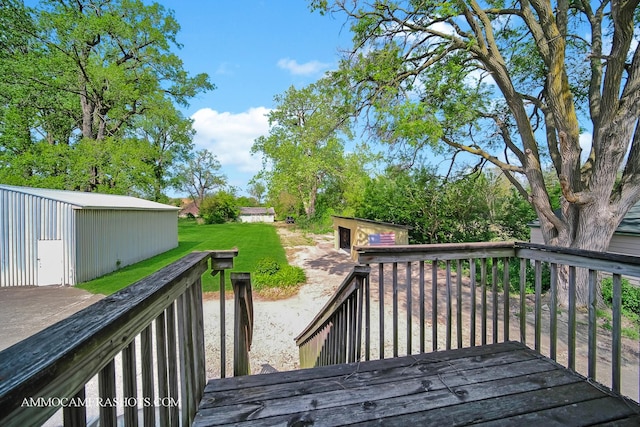 2N562 Atlantic Dr, West Chicago, IL 60185 - wooden deck with an outbuilding and a lawn