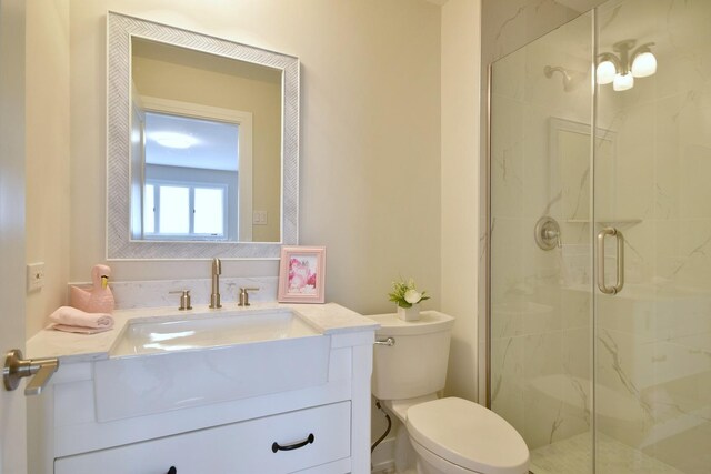 15608 Petunia Ct, Orland Park, IL 60462 - full bathroom with a marble finish shower, toilet, and vanity